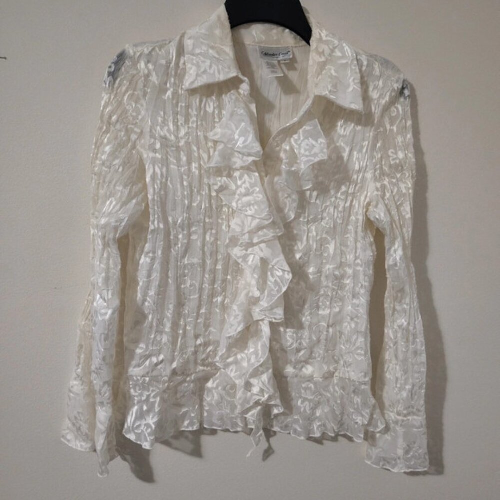 White ruffle blouse